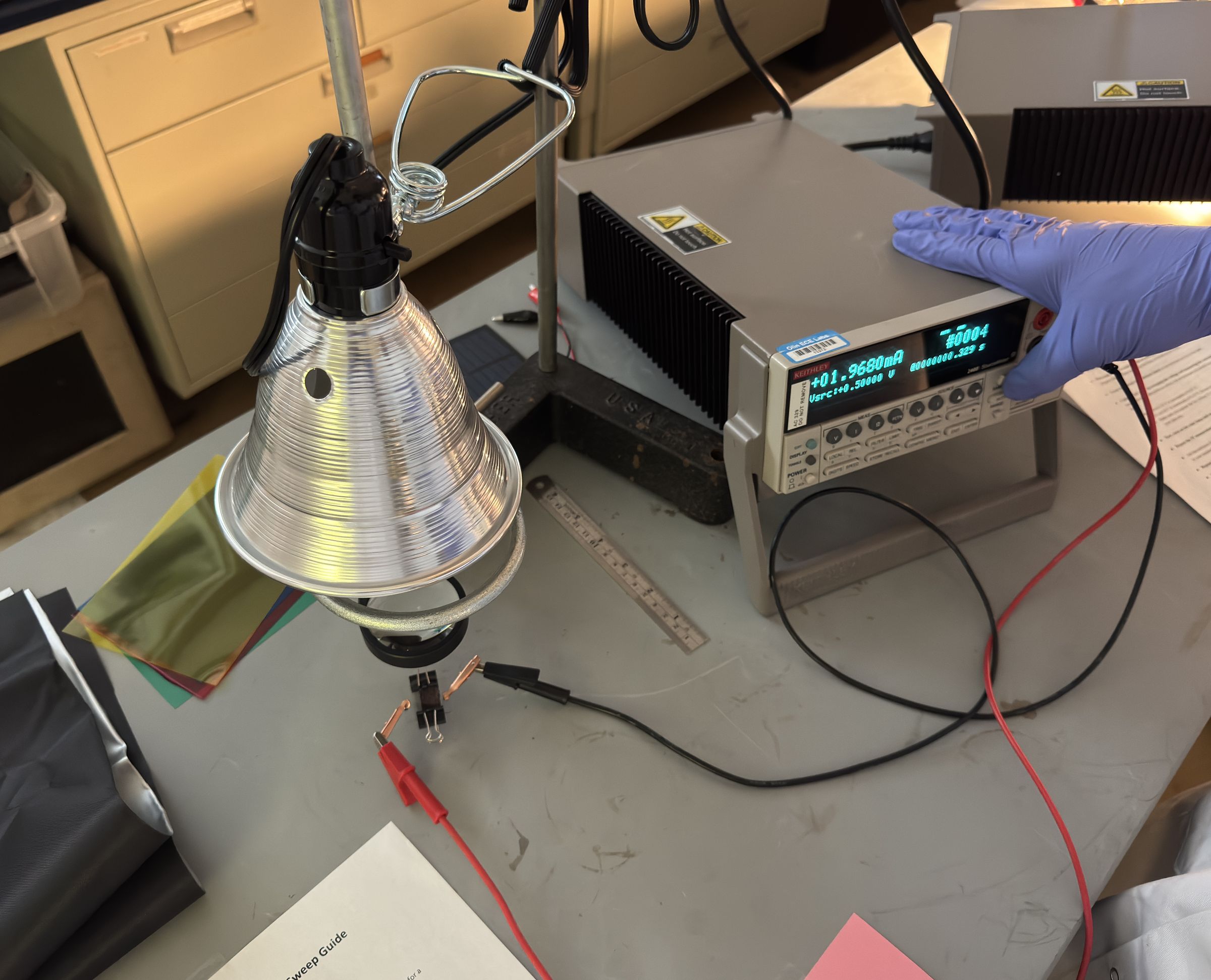 Illumination lamp, wired solar cell, and source meter used for electrical characterization